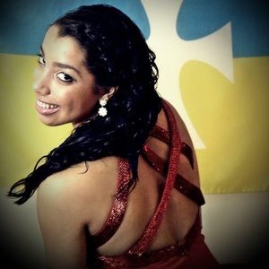 hand beading on back, slit in back of dress few beads coming off in the back